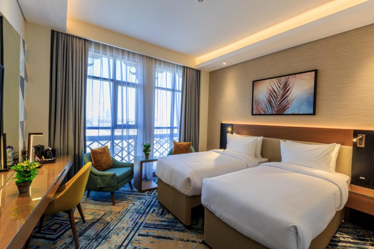 Executive Twin Room Partial Canal View with 20% Off Food & Beverage (excluding in-room dining)