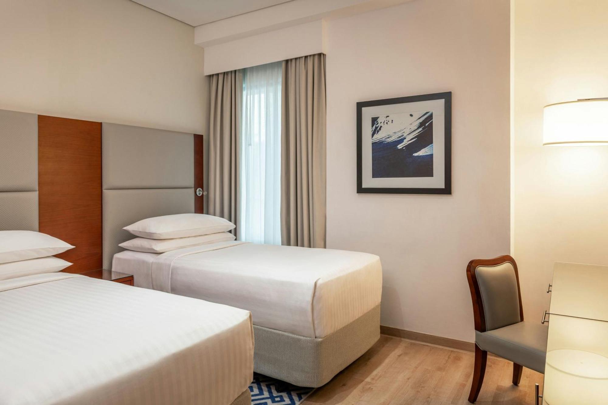 Suite mit 3 Schlafzimmern und seitlichem Meerblick